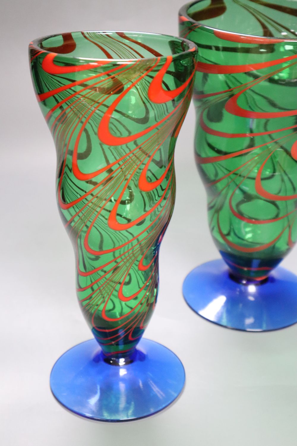 Two Orrefors coloured glass vases, height 25cm